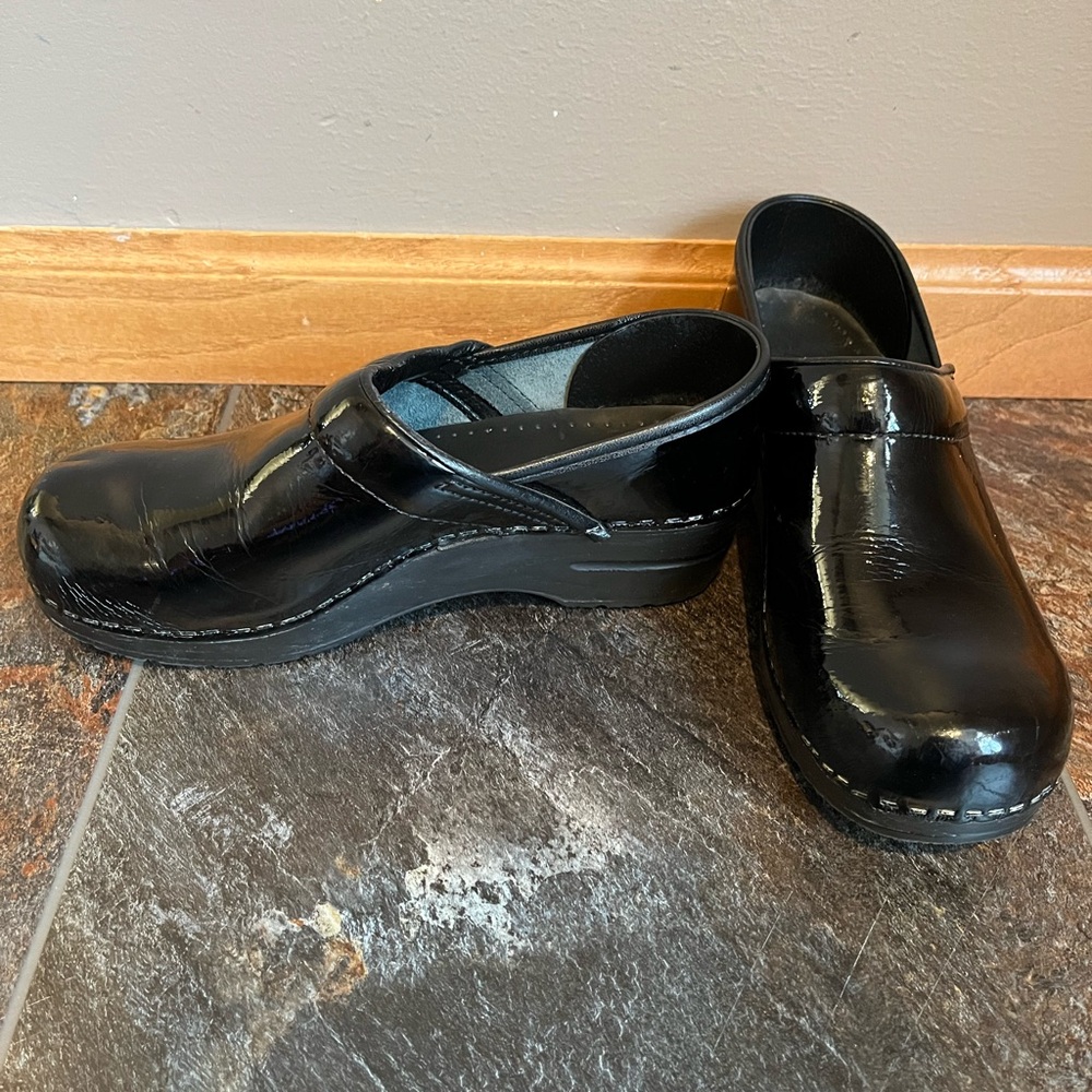 Women’s Dansko black patent leather work clog. Size 38
